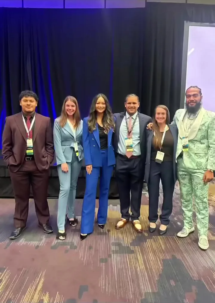GA Jersey Village team members on stage at a leadership summit