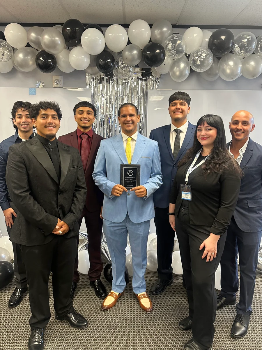 The GA Jersey Village team celebrating an award