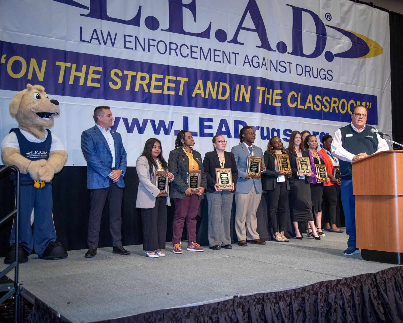 GA Jersey Village team members on stage at a L.E.A.D. event